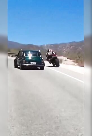 Biker Attempts Overtake On The Inside