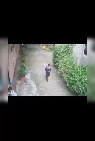 Man Jumps From Apartment Block Narrowly Misses Passer By