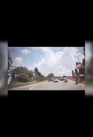 Overtaking Biker Forgets To Stop Overtaking