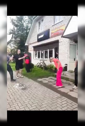 Drunk Guy Kicks Drunk Girl In The Head Outside Russian Bar