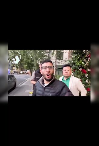 Angry Immigrant Gestures At The Police To Help Him