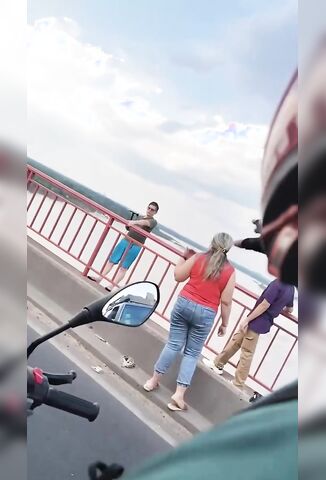 Depressed Man With A Hatchet Chops Himself As He Jumps From Tall Bridge