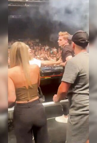 Tweaking Concert Goer Jumps On Stage Attacks DJ Then Gets Beaten By Security