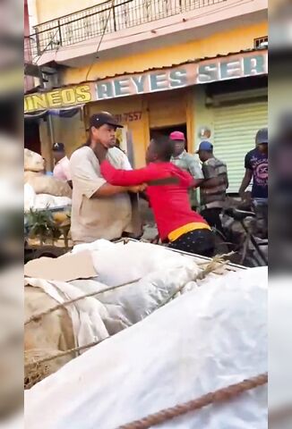 Ponytailed Dude Gets Knocked Out Cold With A Lump Of Wood During Road Rage