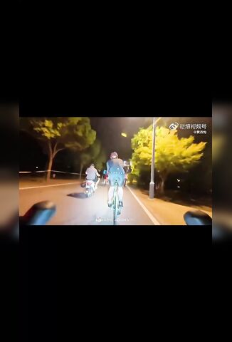 Cyclist Skids And Wipes Out Another During Night Race