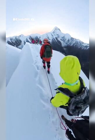 Woman On Expedition Slides Off Mountain Top In A Very Casual Way