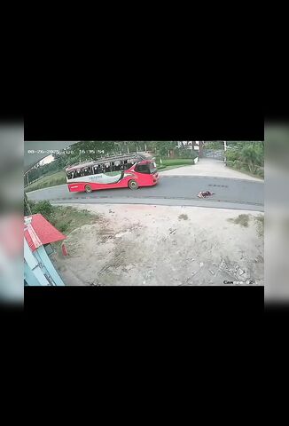 Woman Crossing The Road Wiped Out By Passing Coach