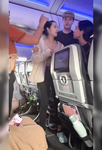 Woman Attempts To Open Emergency Exit Because Her Pilot Boyfriend Told Her A Sound Wasn’t Normal