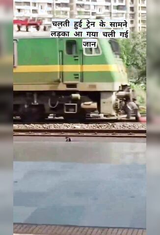 Nonchalant Man Crosses The Train Tracks