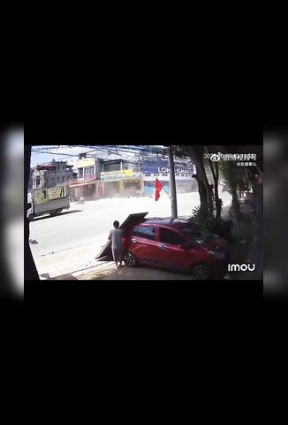 Tyre Explodes On Passing Truck Leaving A Man Scratching His Lucky Head
