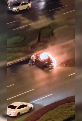 Electric Car Crashes Catches Fire & The Doors Won't Open With The Driver Left Inside