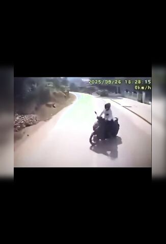 Biker Falls Into His Own Ready Made Coffin After Crash