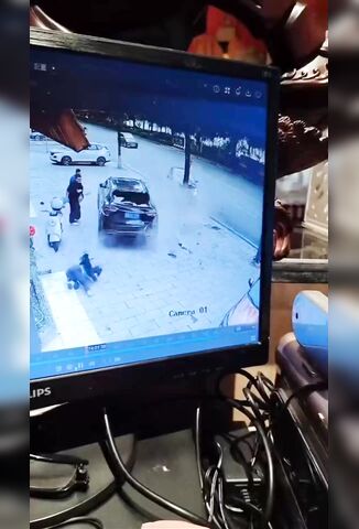 Nasty Crash In China After Lady Gets Off Her Scooter