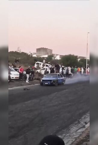 Race Goer Stands Too Close To The Action