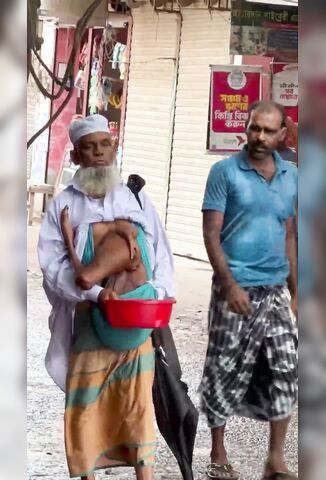 Begging With Extra Hands On The Streets