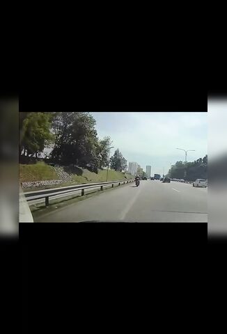 Biker Decides To Take A Look In The Back Of A Parked Van
