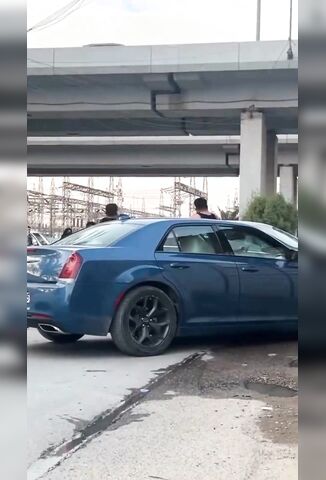 Cop Takes A Rock To The Head During Roadside Dispute