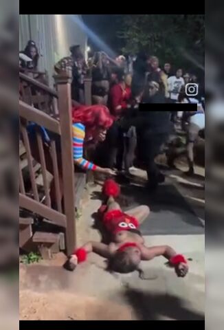 Vicious Halloween Right Hook Leaves Girl Sprawled Topless On The Sidewalk