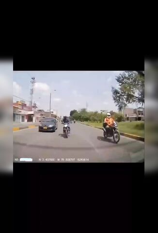 Biker Bumps Another Biker Sending Him Into An Innocent Pedestrian