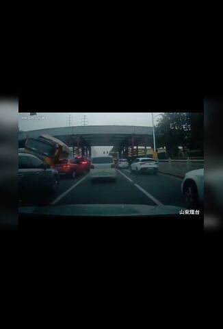 Overturning Truck Buries Driver Under Rubble