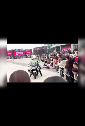 Police Biker Runs Over Kid At The Show He's More Worried About His Bike
