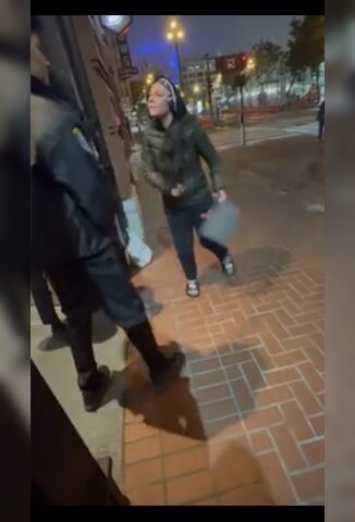 Girl Lays Hands On A Bouncer So He Slaps Her Into The Sidewalk