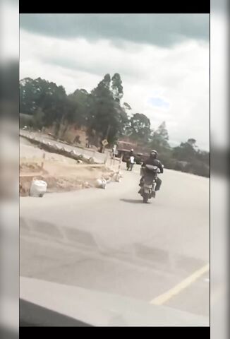 Two Bikers Go Head To  Head