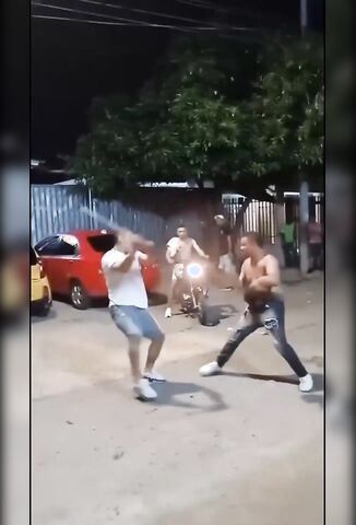 Man Gets Beaten With A Metal Pole And Then Stabbed In The Back During Street Fight