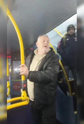 Tommy Robinson Supporter On The Bus