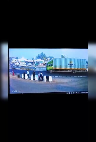 Waiting To Cross The Road