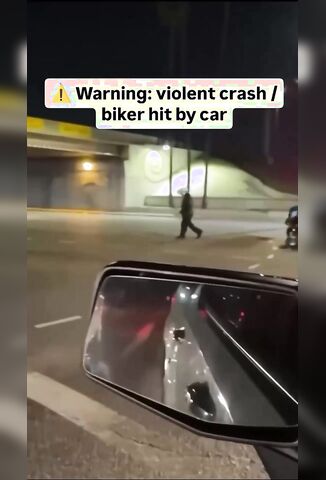 Biker Ragdolled By A Speeding Car Trying To Make The Lights