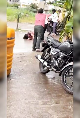 Old Man Attacks His Wife In The Street With A Machete And Gets Knocked Out Cold