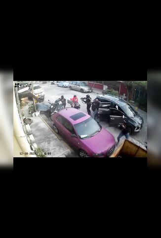 Girl Sits On Her Bike In The Middle Of A Shootout Looking Perplexed