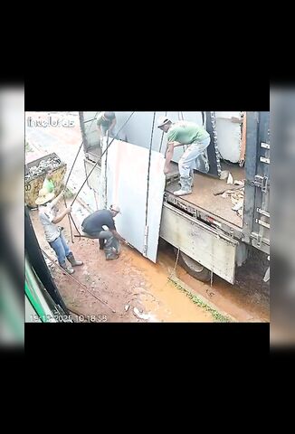 Poor Guys Last Day At Work Unloading Concrete Panels