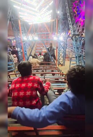 Trying To Look Cool Jumping On The Carnival Ride In India