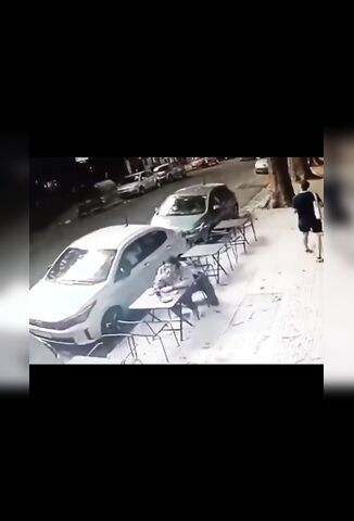Man Enjoying A Morning Coffee Gets Knocked Out By Falling Glass
