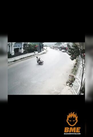 Biker Takes The Corner Too Wide And Slides Under A Bus