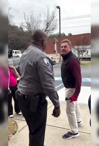 Angry Racist White Man Versus A Calm Black Security Guard