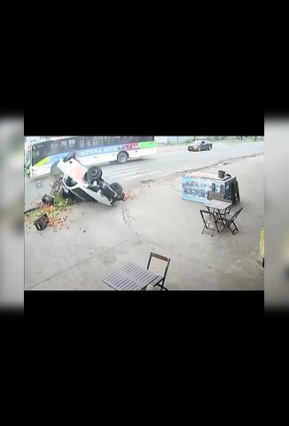 Biker Becomes Part Of A Fruit Trucks Load