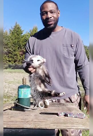 About To Cook Himself An Opossum For Views