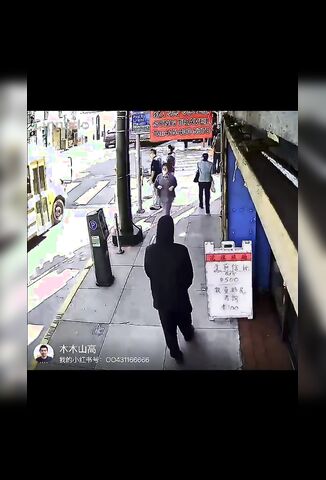 Random Man Stabbed In The Back On The Street By Lunatic