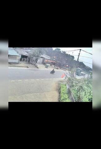 Biker Plays Chicken With A Truck