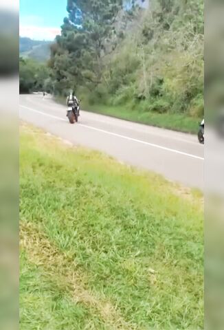 Biker Slides Into Oncoming Car With Fatal Results