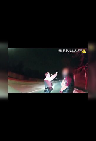 Officer Conducting Field Sobriety Test At The Roadside Becomes One With A Pickup