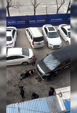 Flying Headbutts During Road Rage Argument In China