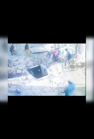 Family Fall into Open Sewer In India