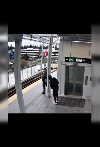 Escaped Lunatic Attempts To Push A Man In Front Of An Oncoming Train