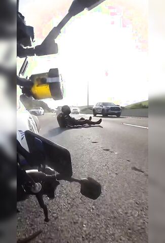 Trash In The Road And Then A Biker In The Road