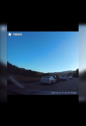 Biker Attempting To Weave Traffic Comes Unstuck