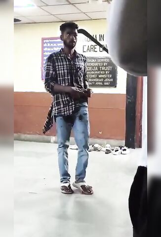 A Man Calmly Waits His Turn For Trauma Care